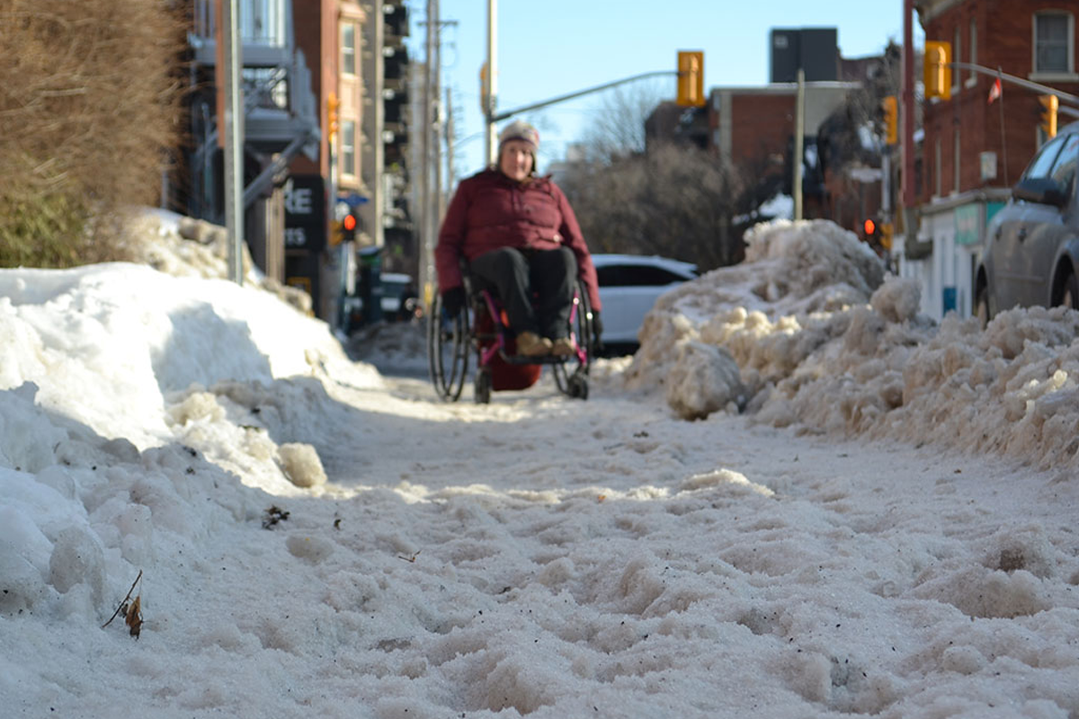 Snow and ice prevent people who use mobility devices from accessing public space in the winter (caption: Alexandra Elves)