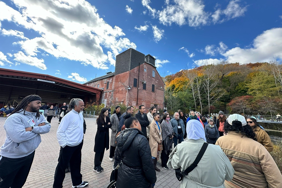 Group of people during a tour of Evergreen Brickworks.