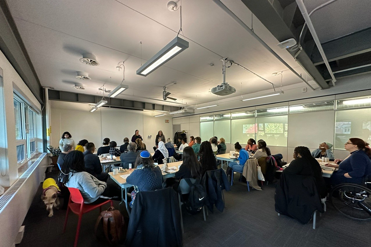 Group of people gathering at a workshop.